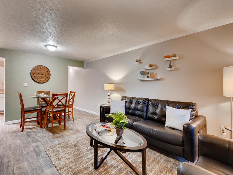 Living Room and Dining Area | The Atrii Apartments in Denver, CO