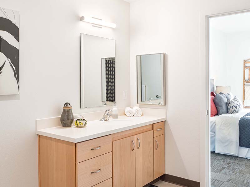 Bathroom Mirror with Wood Style Cabinets | Nesika Illahee