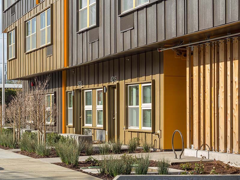 Exterior Apartment Complex with Foliage | Nesika Illahee