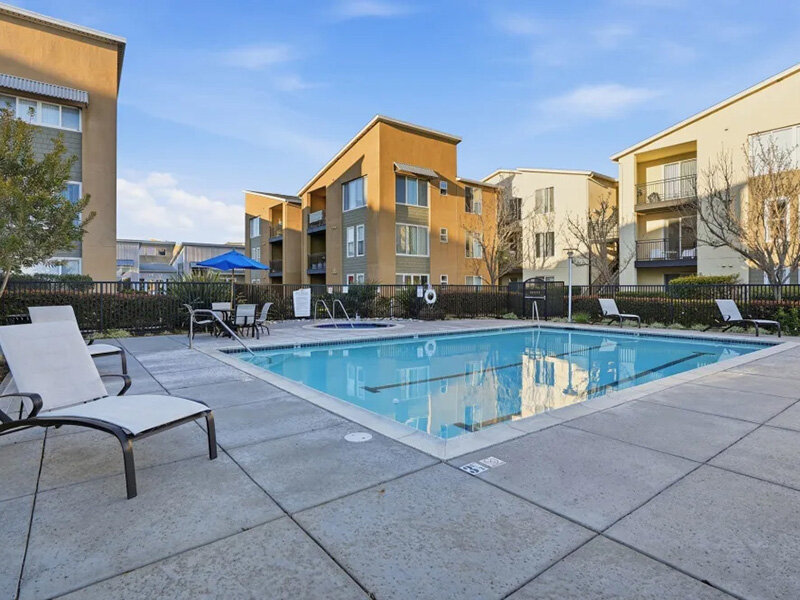 Outdoor Apartment Pool with Apartment Building | Pacific Shores
