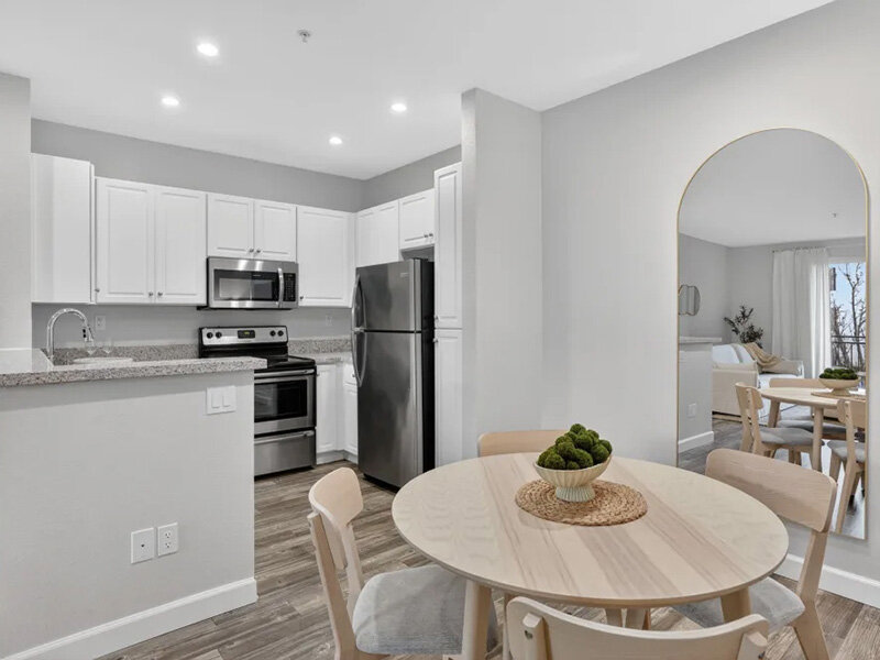Kitchen with Dining Room Table and Ceiling Lights | Pacific Shores