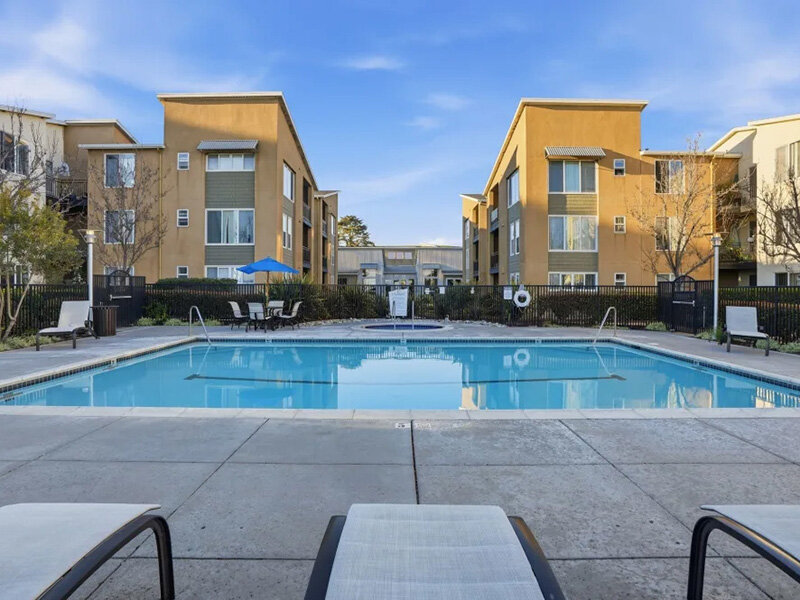 Exterior Outdoor Pool with Lounge Seats | Pacific Shores