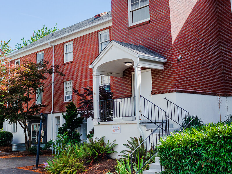 Exterior Apartment Complex with Stairwell Entrance | Milepost 5