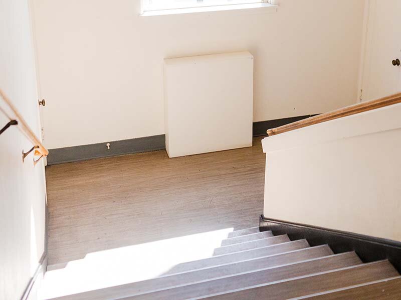 Stairwell with Wood Style Flooring | Milepost 5