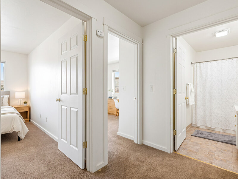 Interior Bedroom Hallway with Carpeted Flooring | Kagy Village