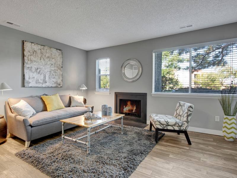 Front Room with Multiple Windows and a Fireplace | The Grove at City Center