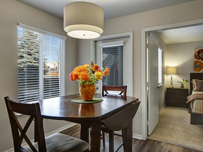 Apartment Kitchen with Dining Table and Ceiling Light | The Willows at Printers Park Apartments