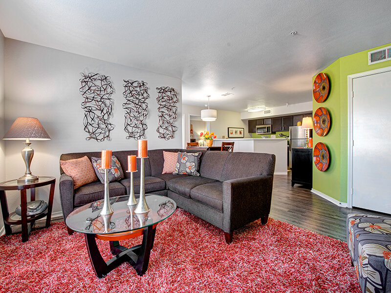 Open Apartment Living Room with Entrance to Kitchen and Apartment Door | The Willows at Printers Park Apartments