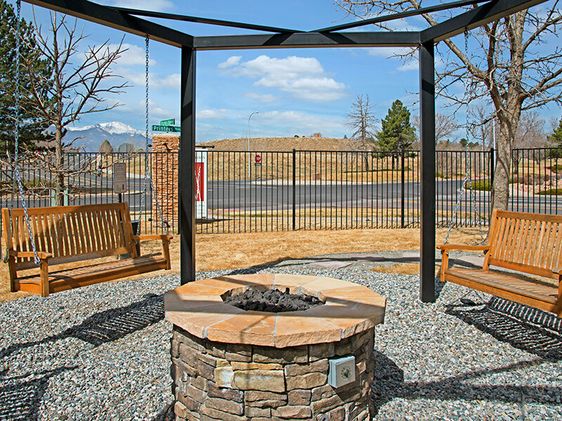 Exterior Firepit at Apartment Complex | The Willows at Printers Park Apartments