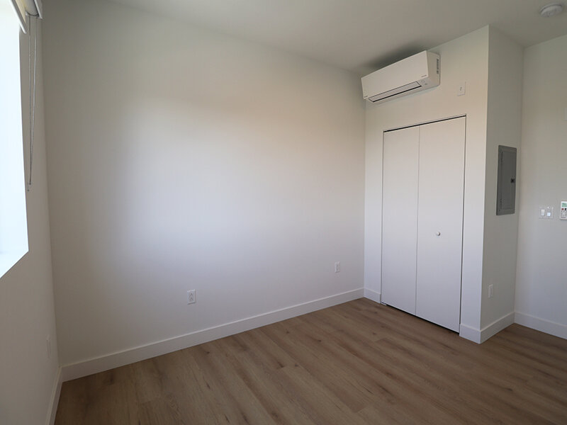 Bedroom with Wood Flooring | Missouri Apartments
