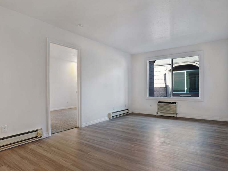 Living Room with Wood Flooring | Rockway Commons