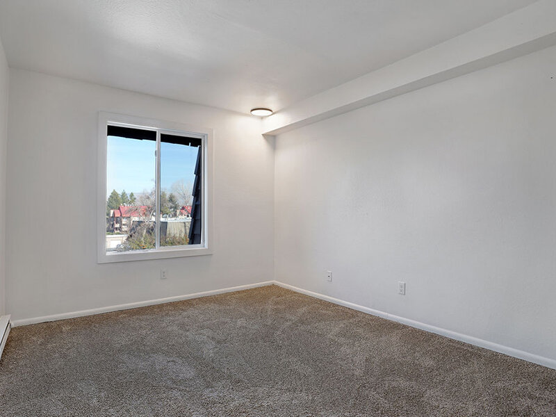 Carpeted Bedroom | Highland Commons