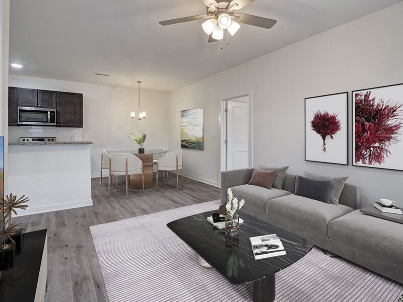 Living Room with Ceiling Fan and Light | Merchants Walk