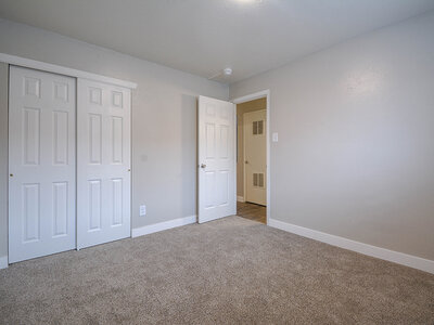 Carpeted Bedroom | Eagle Crest Apartments in Lakewood, CO