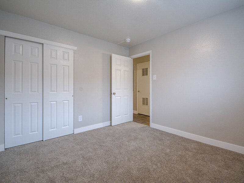 Carpeted Bedroom | Eagle Crest Apartments in Lakewood, CO