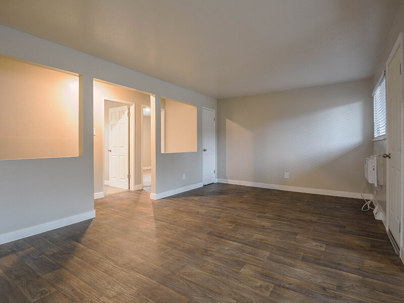 Living Room with Wood Flooring | Eagle Crest Apartments