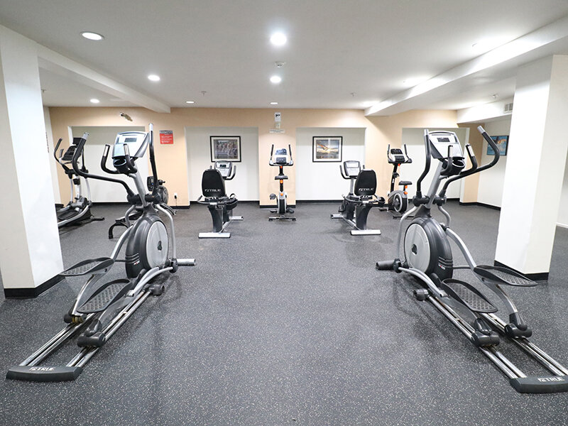 Community Fitness Room with Ceiling Lights | Bella Vista
