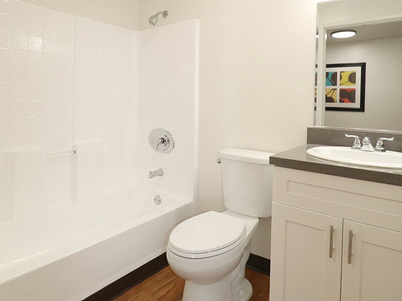 Bathroom with Wood Style Flooring and Shower | Bella Vista