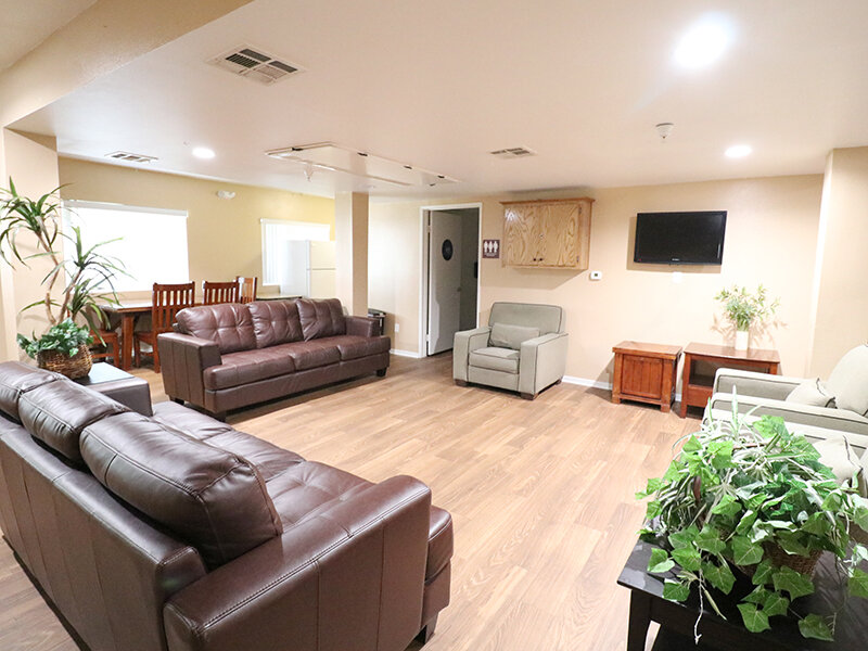 Community Clubhouse with Wood Style Flooring and Seating | Bella Vista