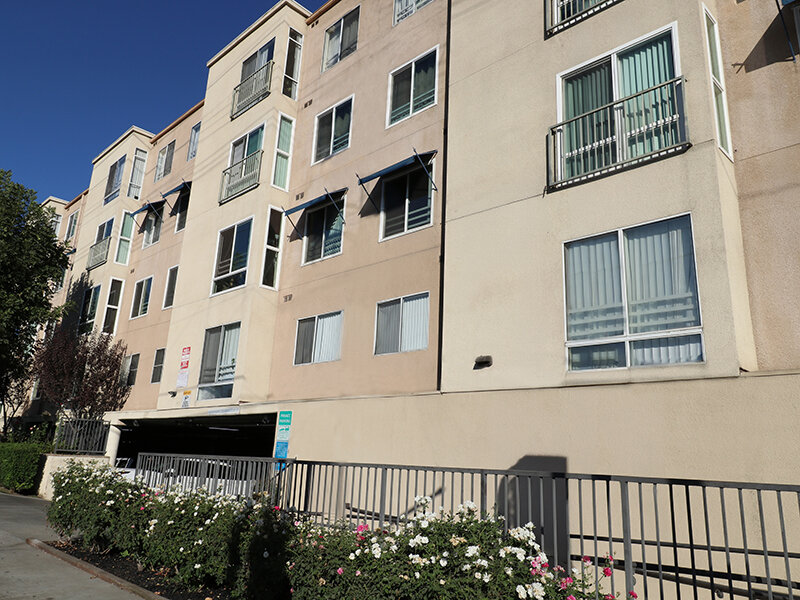 Exterior View of Apartment Porperty with Flowers | Bella Vista
