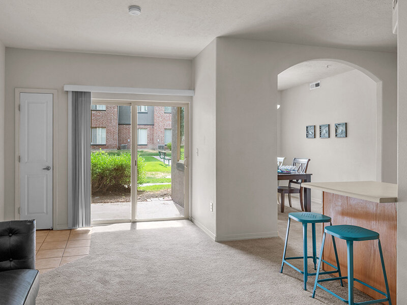 View of Patio with Living Room and View of Dining Room Table | Pleasant Springs