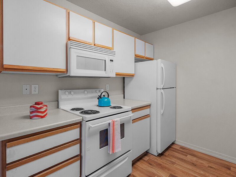 Kitchen with Wood Style Flooring and Cabinets | Pleasant Springs
