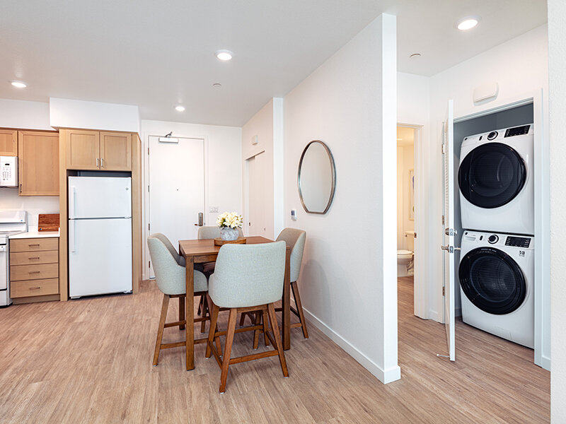 Kitchen with Washer and Dryer and Dining Room Table | View at Blossom Hill