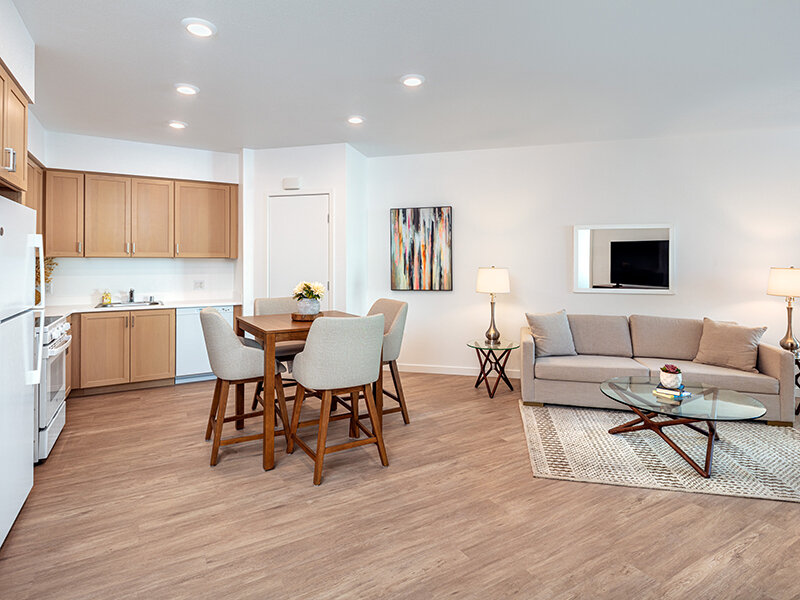 Kitchen with Living Room and Wood Style Flooring and Dining Room Table | View at Blossom Hill