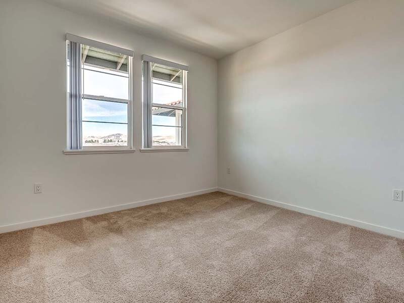 Bedroom with Dual Winows and Carpeted Floorings | Ageno Affordable