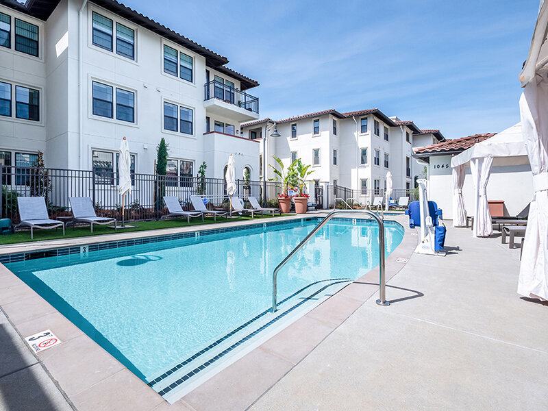 Outdoor Swimming Pool with Apartment Complex | Ageno Affordable