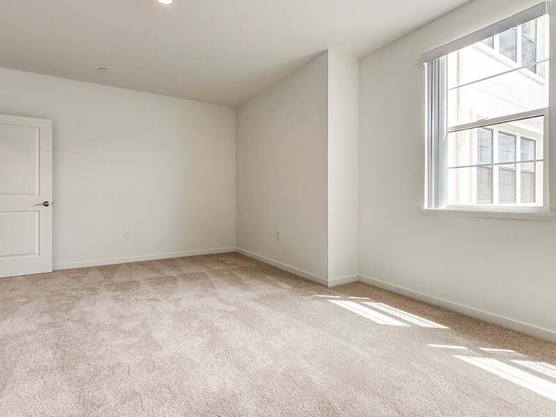 Bedroom with Carpeted Flooring and Window | Ageno Affordable