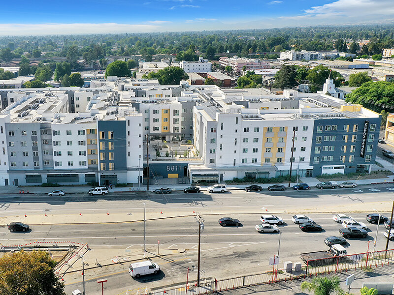 Aerial View of Apartment Complex with Highway | Mission Gateway
