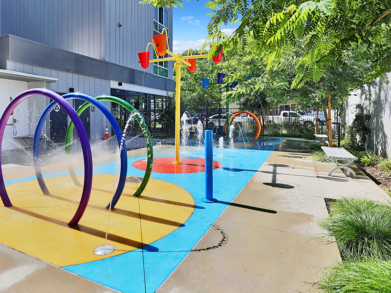 Outdoor Splash Pad with Foliage | Mission Gateway