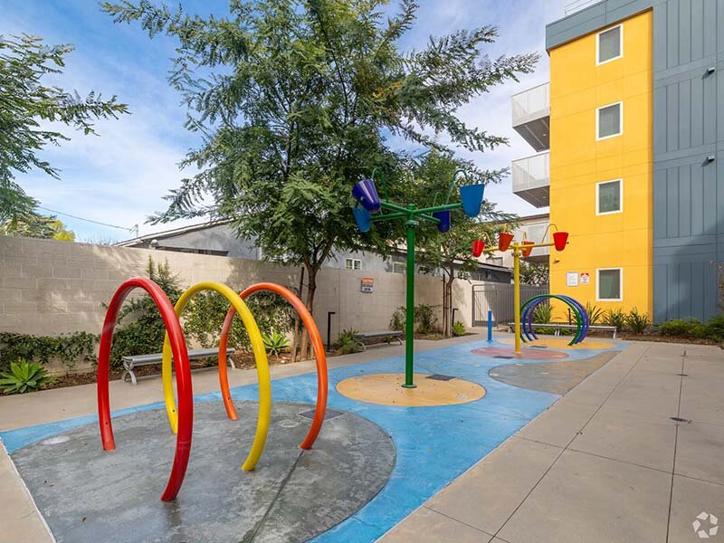 Outdoor Splash Pad with View of Apartment Property | Mission Gateway