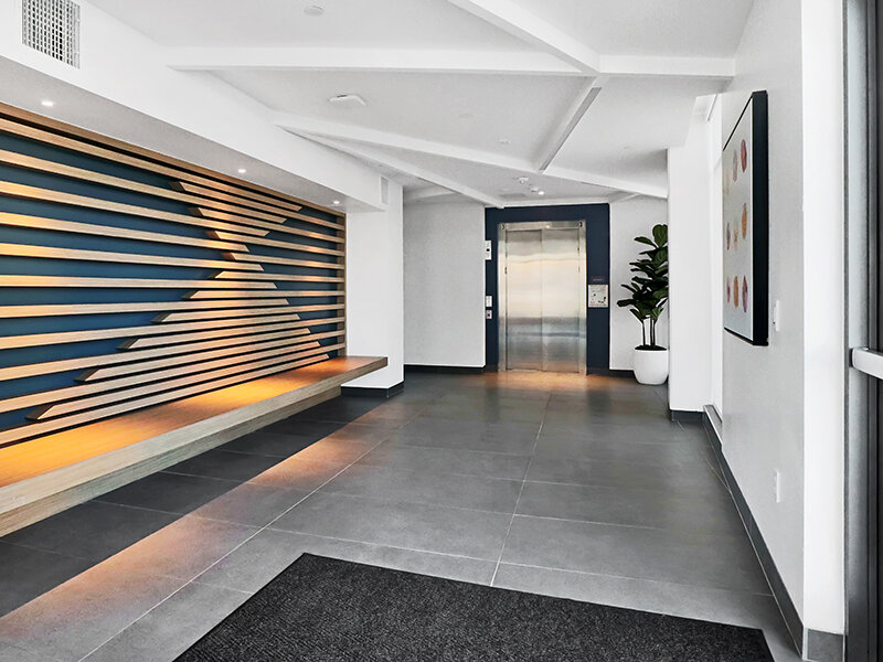 Apartment Hallway with View of Elevator | Mission Gateway