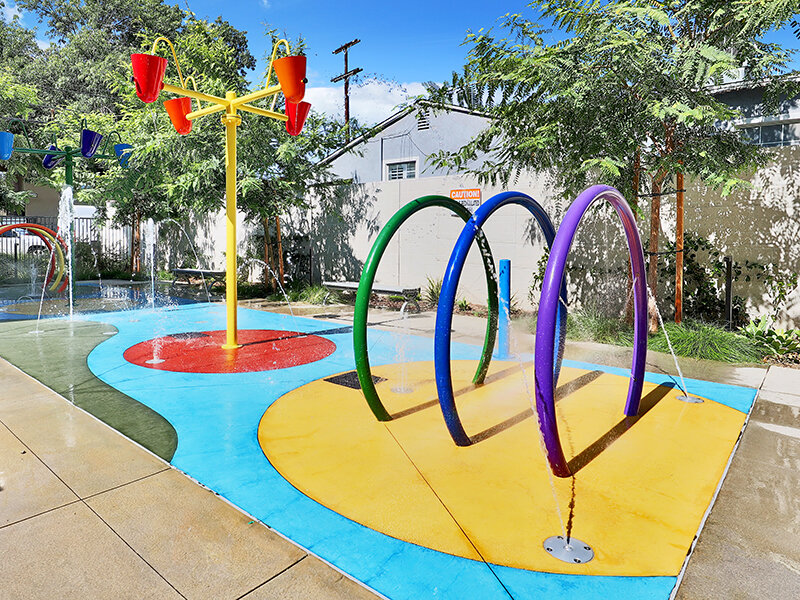 Splash Pad with View of Apartment Property | Mission Gateway