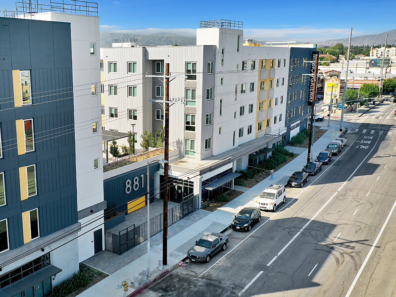 Exterior View of Apartment Complex with View of Entrance | Mission Gateway