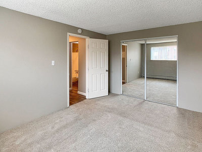 Bedroom | The Reserve at Water Tower Village Apartments in Arvada, CO