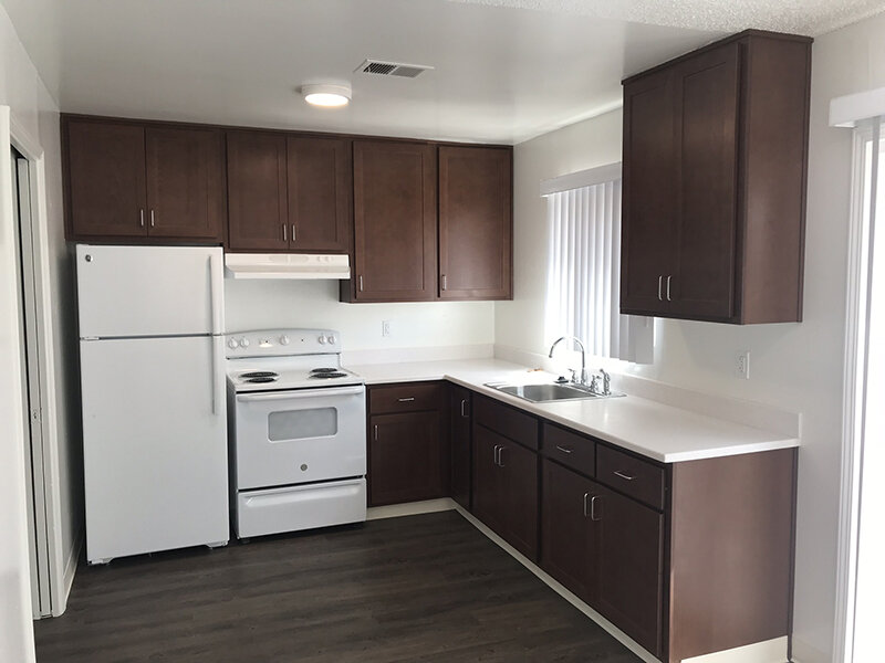 Interior Kitchen with Wood Style Flooring and Cabinets | Meadows Holly