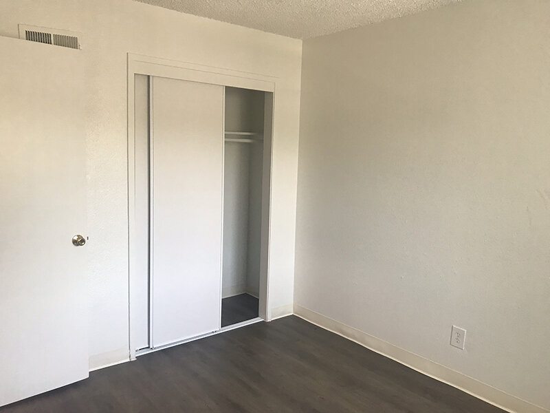 Bedroom with Interior Closet and Wood Style Flooring | Meadows Holly