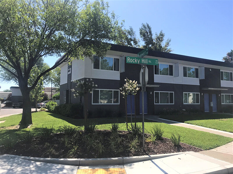 Apartment Area with Sidewalk and Landscaping | Meadows Holly