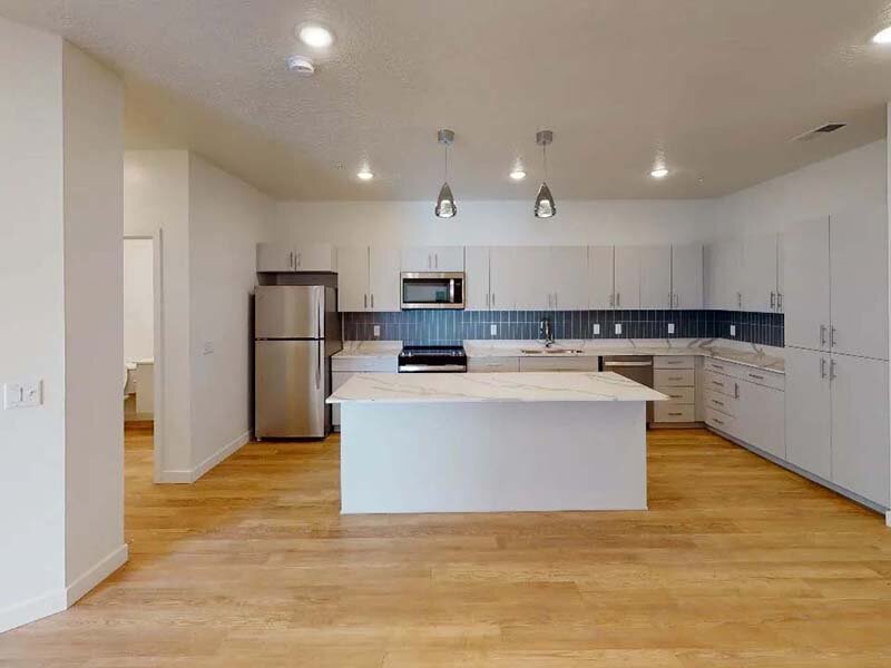 Fully Equipped Kitchen with High Ceiling | Seven02 Main