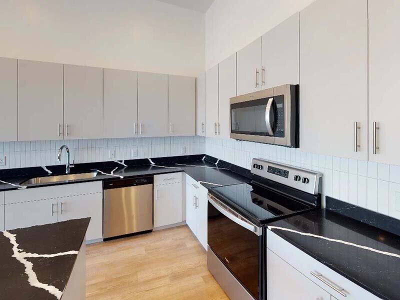 Fully Equipped Kitchen with Stainless Appliances | Seven02 Main
