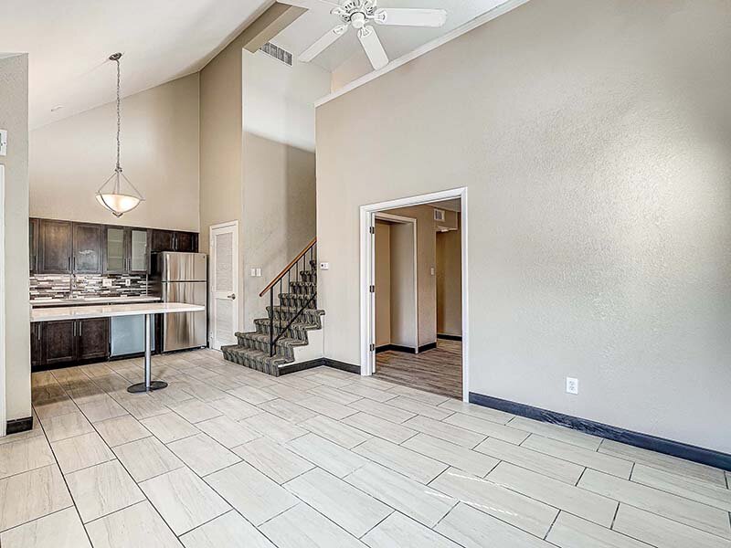Apartment View of Stairwell with Ceiling Light and Fan | Avia Lofts at Founders Road