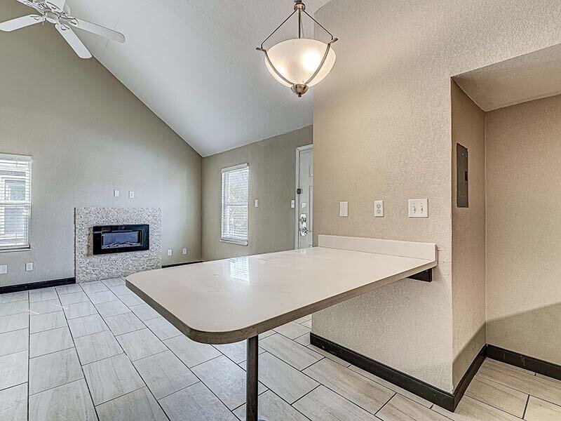 Living Room with Ceiling Light and Table | Avia Lofts at Founders Road