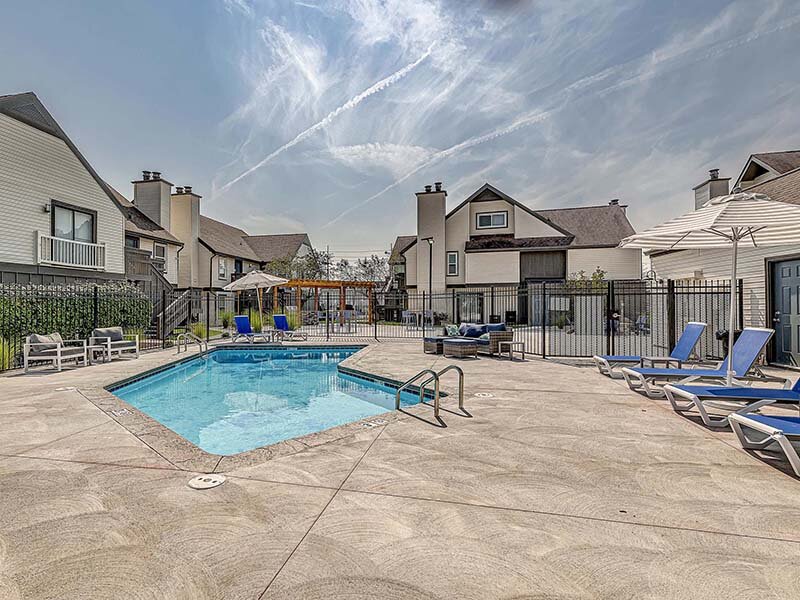 Community Swimming Pool with View of Apartment Complex | Avia Lofts at Founders Road