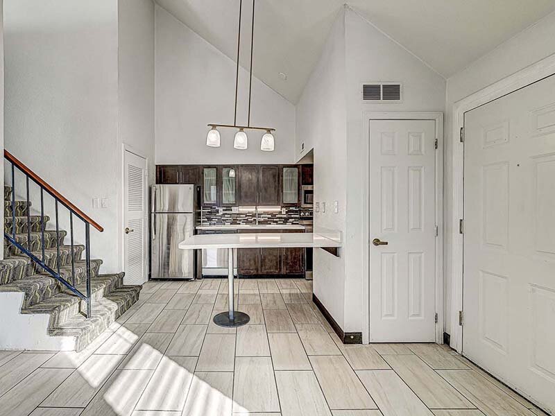 Kitchen with Tile Style Flooring and Ceiling Lights | Avia Lofts at Founders Road