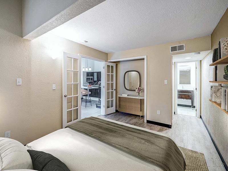 Bedroom with View of Kitchen and Bathroom | Avia Lofts at Founders Road