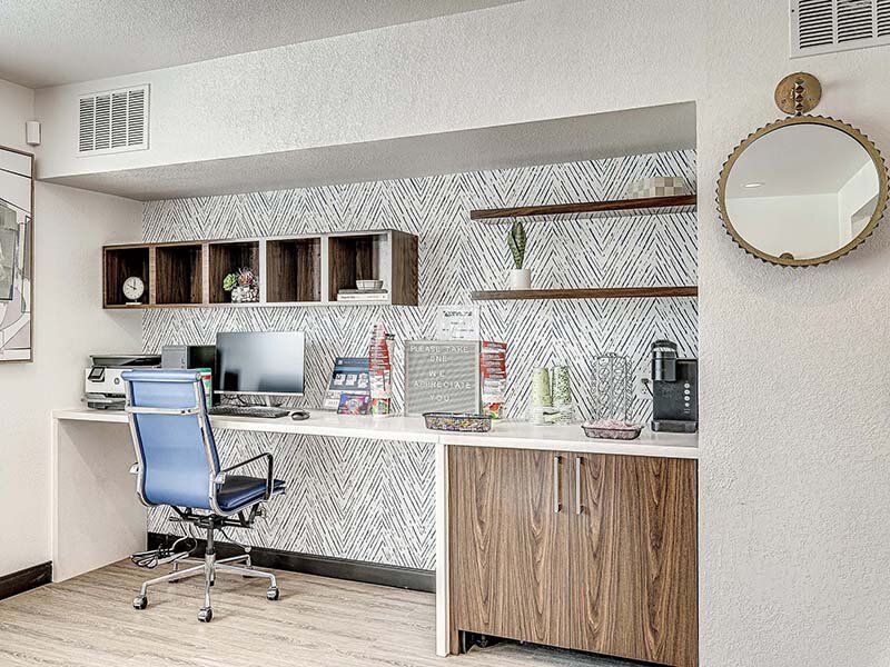Clubhouse Coffee Bar with Wall Art and Mirror | Avia Lofts at Founders Road