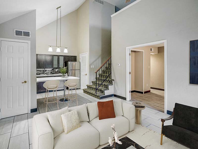 Living Room with Seating and View of Kitchen | Avia Lofts at Founders Road